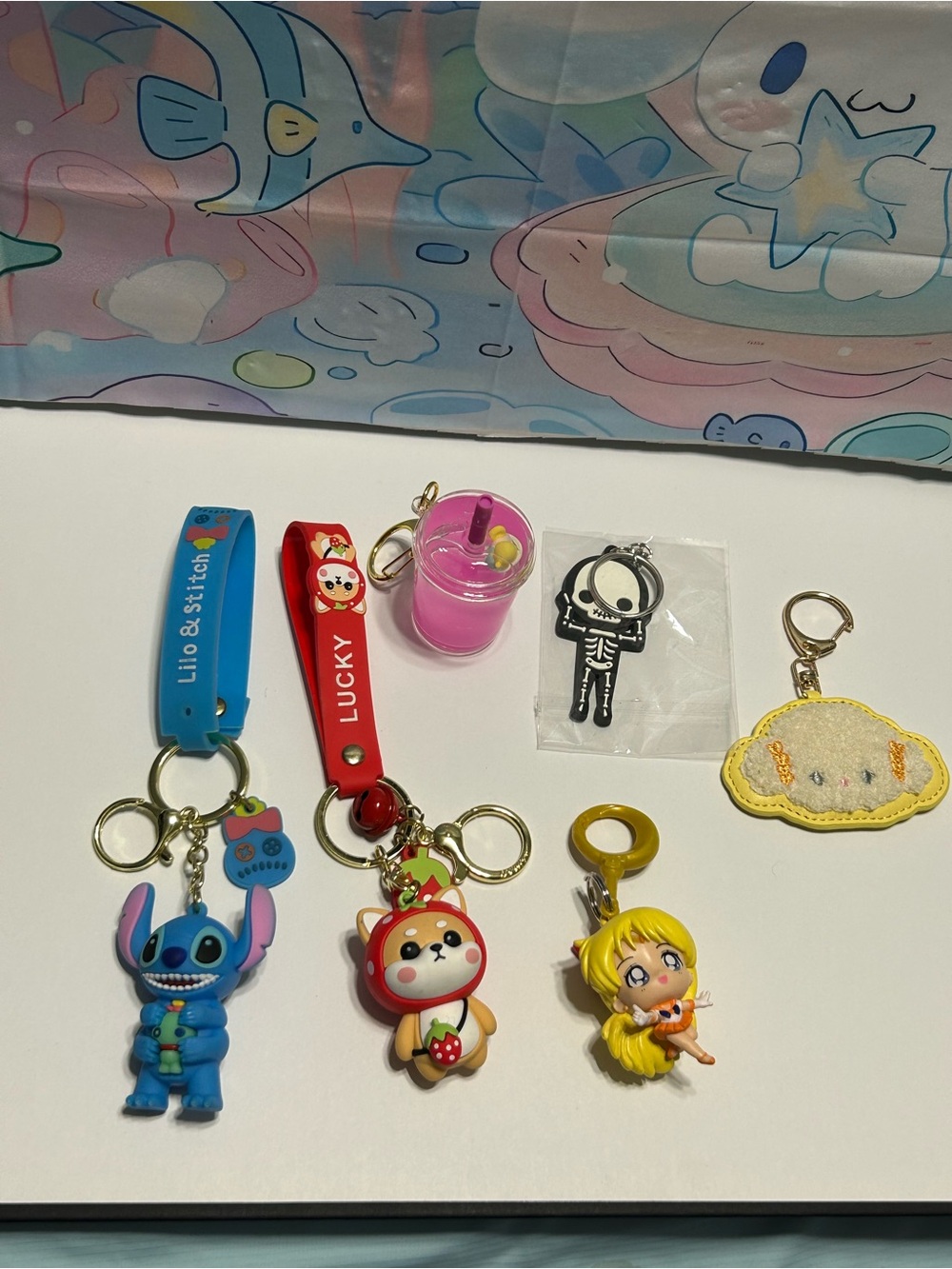 Assorted Character Keychain Lot — Blue, Red, Yellow, Pink, Gold